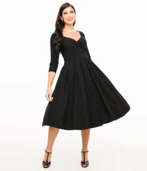 Unique Vintage 1950s Black Bengaline Front Twist Swing Dress